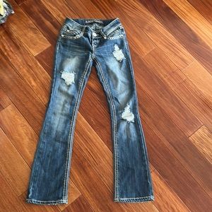 Almost Famous low rise flare ripped jeans size 3